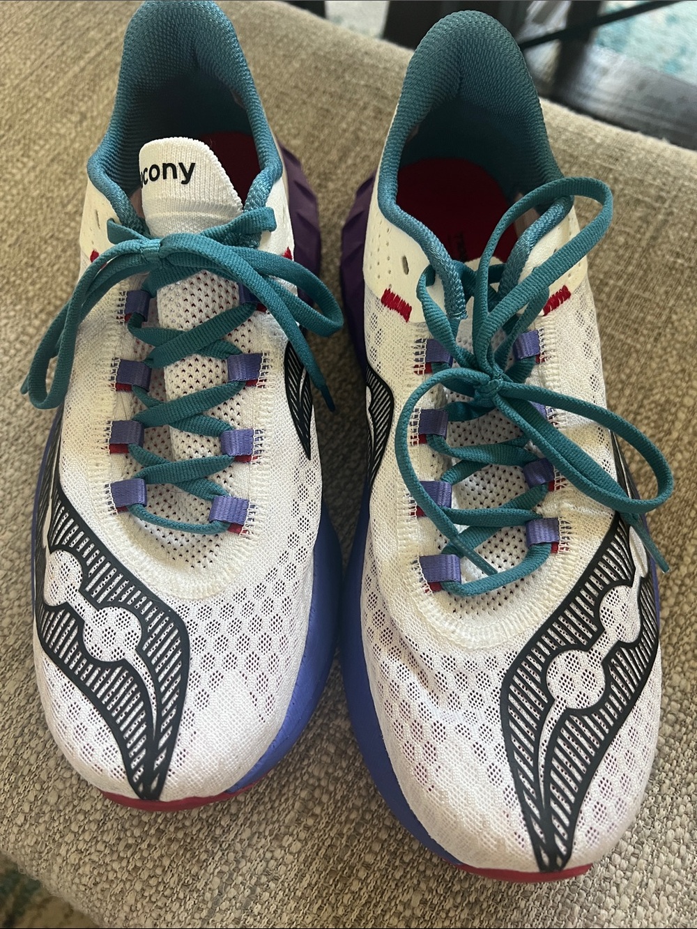 Saucony women’s White Teal & Purple Athletic Sneakers